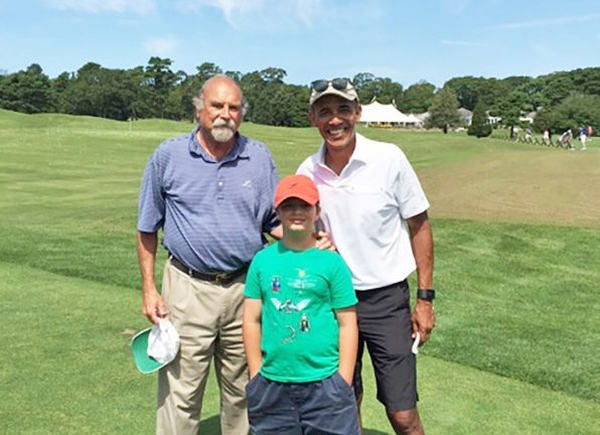 Mike Zoll and Oliver Ames pose with Barack Obama. — Don Costello